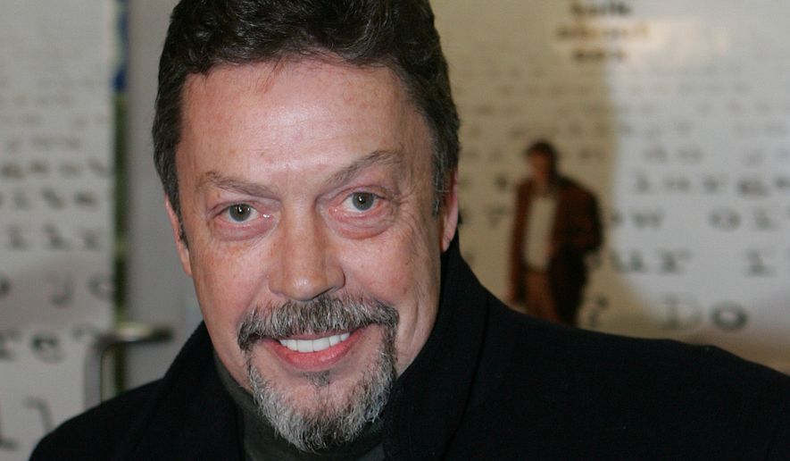 Actor Tim Curry arrives for the premiere of the movie "Kinsey" at the Beekman Theater in New York Wednesday, Nov. 10, 2004. (AP Photo/Frank Franklin II)