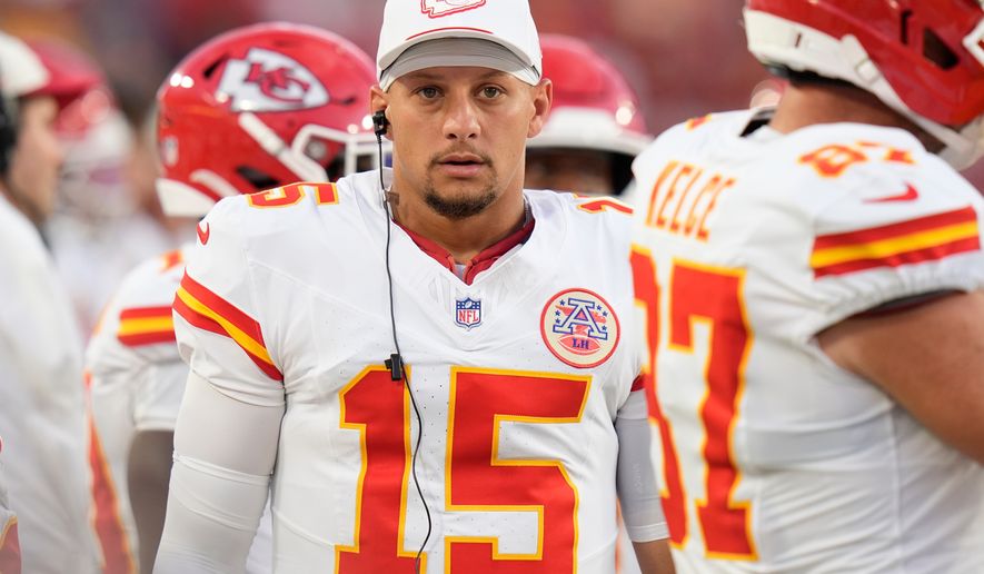 Kansas City Chiefs quarterback Patrick Mahomes (15) walks the sidelines during the first half an NFL football game against the Tampa Bay Buccaneers, Saturday, Aug. 22, 2026, in Tampa, Fla. (AP Photo/Chris O'Meara)