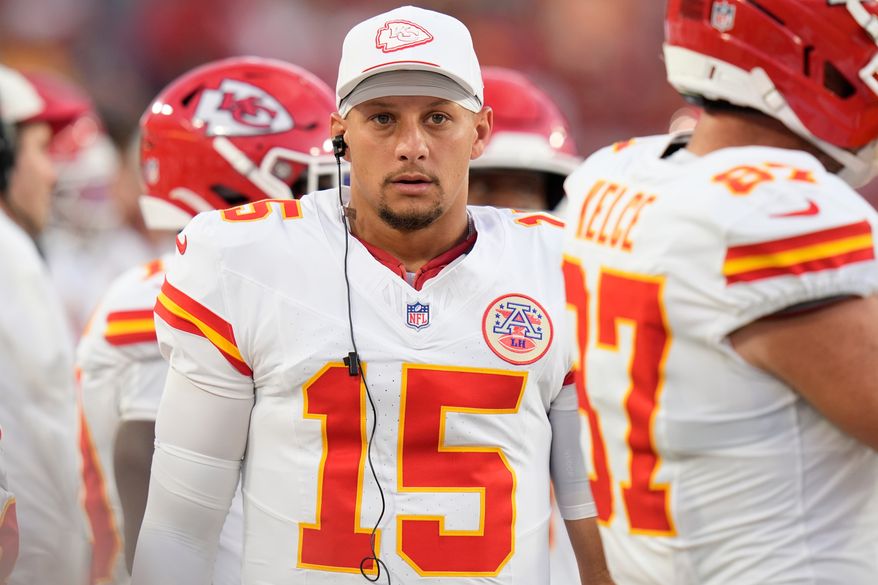 Kansas City Chiefs quarterback Patrick Mahomes (15) walks the sidelines during the first half an NFL football game against the Tampa Bay Buccaneers, Saturday, Aug. 22, 2026, in Tampa, Fla. (AP Photo/Chris O'Meara)