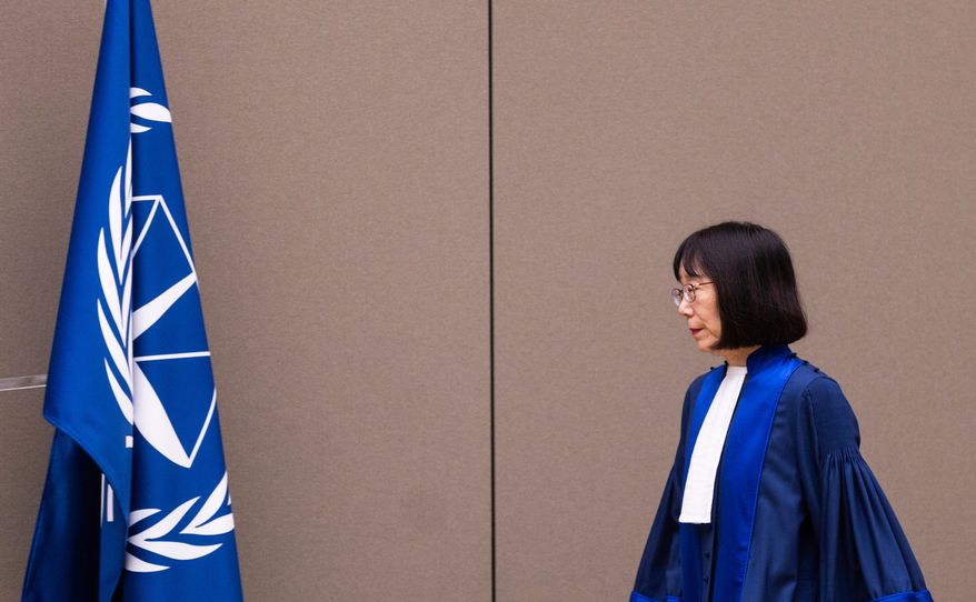 FILE - Judge Tomoko Akane walks before delivering the verdict in the Al Hassan case at the International Criminal Court in The Hague, Netherlands, Wednesday Nov. 20, 2024. (Eva Plevier/Pool Photo via AP, file)