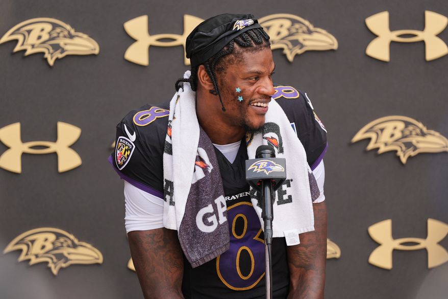 Baltimore Ravens quarterback Lamar Jackson speaks during a press conference following the team's NFL football joint training camp with the Washington Commanders, Wednesday, Aug. 26, 2026, in Owings Mills, Md. (AP Photo/Stephanie Scarbrough)