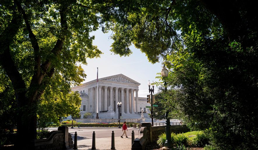 The Supreme Court is seen on the morning after the conservative majority sided with the Trump administration in a case over President Donald Trump's executive order restricting mail-in voting, on Capitol Hill in Washington, Tuesday, Aug. 25, 2026. (AP Photo/J. Scott Applewhite)