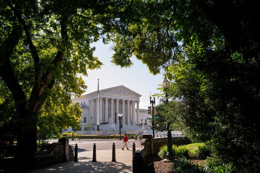The Supreme Court is seen on the morning after the conservative majority sided with the Trump administration in a case over President Donald Trump's executive order restricting mail-in voting, on Capitol Hill in Washington, Tuesday, Aug. 25, 2026. (AP Photo/J. Scott Applewhite)