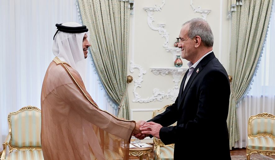 In this photo released by the Iranian Presidency Office, President Masoud Pezeshkian welcomes Qatar's Prime Minister and Foreign Minister Sheikh Mohammed bin Abdulrahman Al Thani for their meeting in Tehran, Iran, Thursday, Aug. 27, 2026. (Iranian Presidency Office via AP)