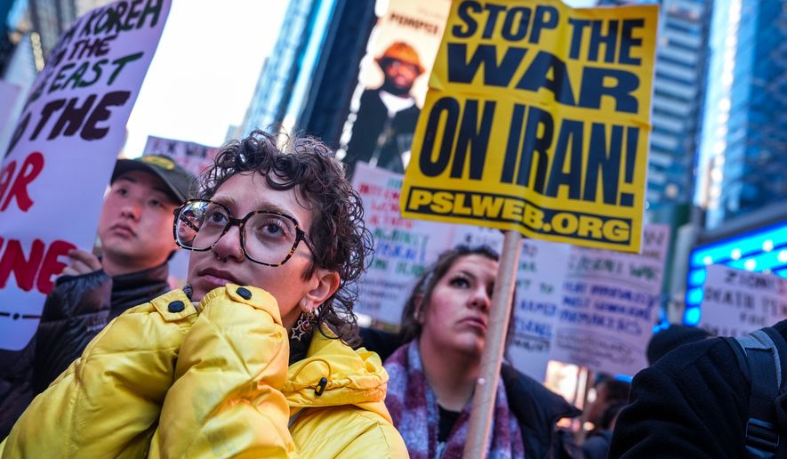 People march while taking part in a protest against the U.S.-Israeli war with Iran, and against conflict in Lebanon, Wednesday, April 8, 2026, in New York. (AP Photo/Ryan Murphy, File)
