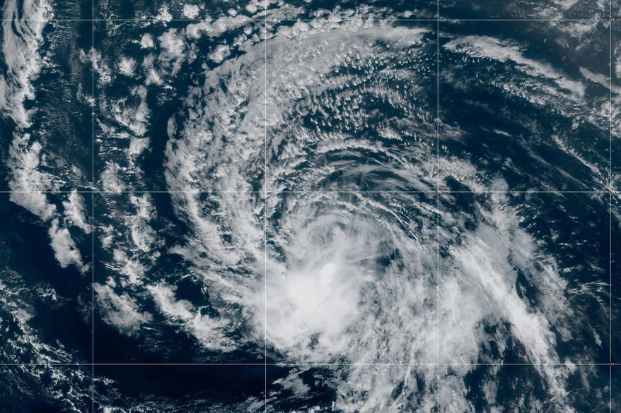 This satellite image released by NOAA shows Tropical Storms Dolly over the Atlantic Ocean, Thursday, Aug. 27, 2026. (NOAA via AP)