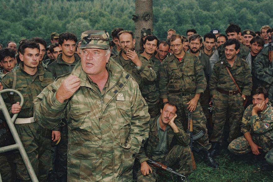 Bosnian Serb Gen. Ratko Mladic speaks to soldiers near the Bosnian town of Cazin, Sept. 4, 1994. (AP Photo/Radivoje Pavicic, File)