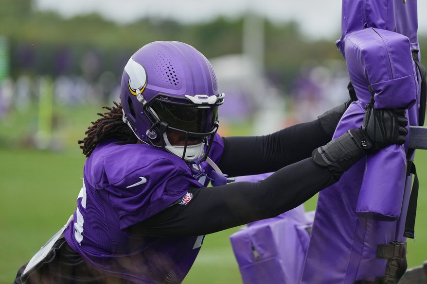 Minnesota Vikings linebacker Dallas Turner trains during a joint NFL football practice with the Baltimore Ravens, Thursday, Aug. 20, 2026, in Eagan, Minn. (AP Photo/Abbie Parr)