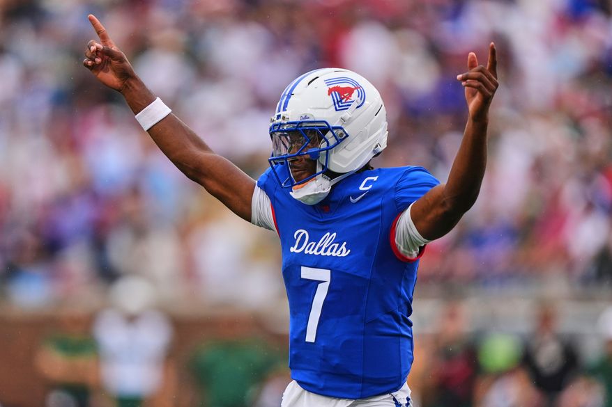 FILE - SMU quarterback Kevin Jennings celebrates a touchdown during the first half of an NCAA college football game against Baylor, Sept. 6, 2025, in Dallas. (AP Photo/LM Otero, File)