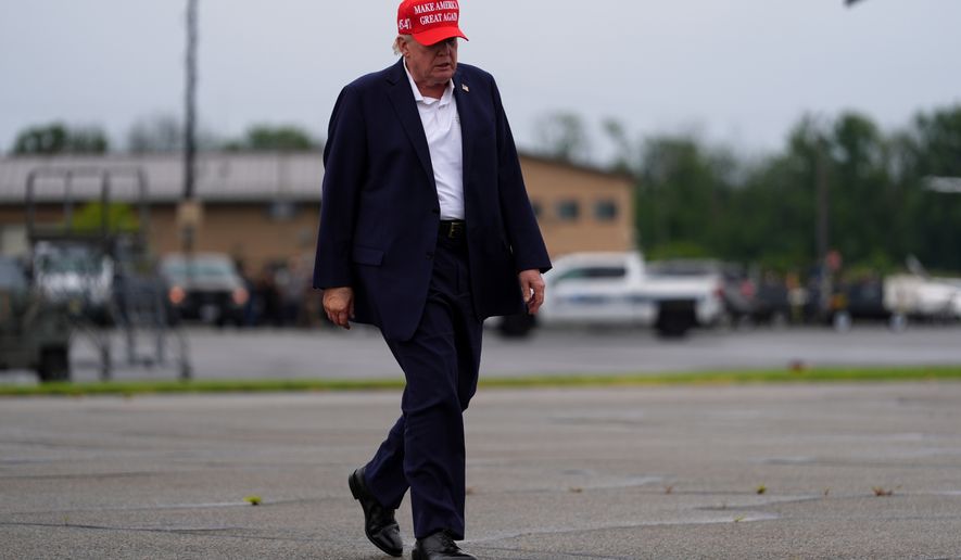 President Donald Trump walks to board Air Force One at Morristown Airport, Sunday, Aug. 16, 2026, in Morristown, N.J. (AP Photo/Julia Demaree Nikhinson)