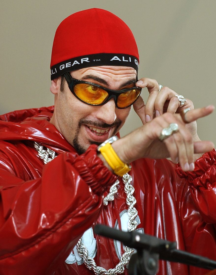 Comedian and television personality Sacha Baron Cohen, in one of his characters, Ali G an MC from Staines, addresses the Harvard University class of 2004, and their friends and families, during Class Day exercises at the school, in Cambridge, Mass., Wednesday, June 9, 2004. (AP Photo/Steven Senne)