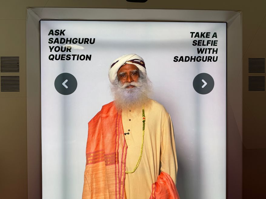 A lifelike Sadhguru chatbot powered by artificial intelligence is displayed Wednesday, Aug. 19, 2026, in Los Angeles. (AP Photo/Krysta Fauria)