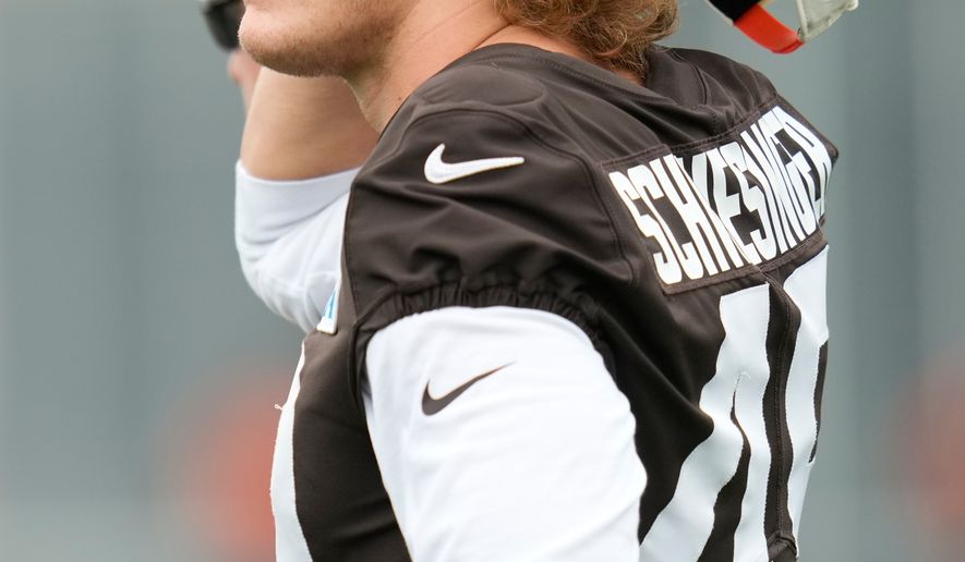 Cleveland Browns linebacker Carson Schwesinger (49) watches from the sidelines during an NFL football training camp, Saturday, Aug. 1, 2026, in Berea, Ohio. (AP Photo/Sue Ogrocki)