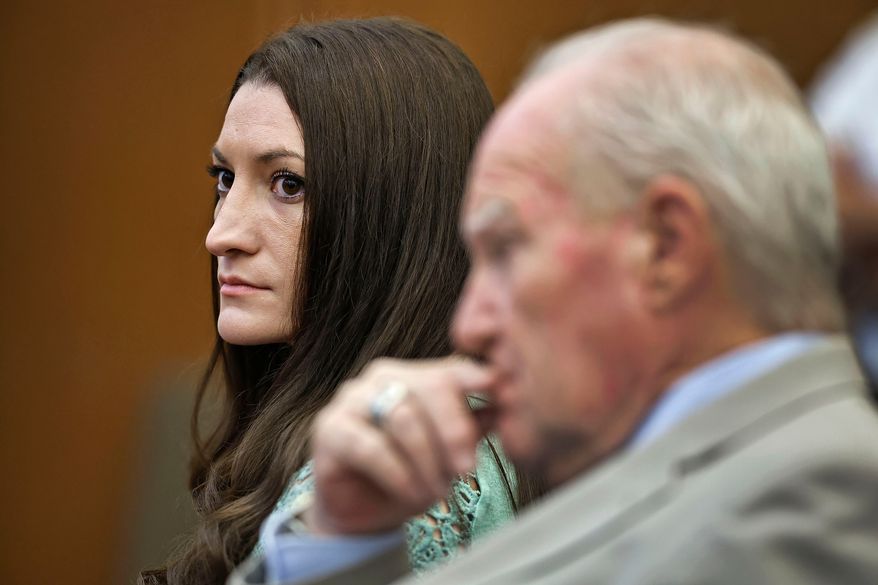 Lindsay Clancy watches jurors enter the courtroom for their second day of deliberations as defense attorney Kevin Reddington sits to her right at Plymouth Superior Court in Plymouth, Mass., Friday, Aug. 28, 2026. (Greg Derr/The Patriot Ledger via AP, Pool)