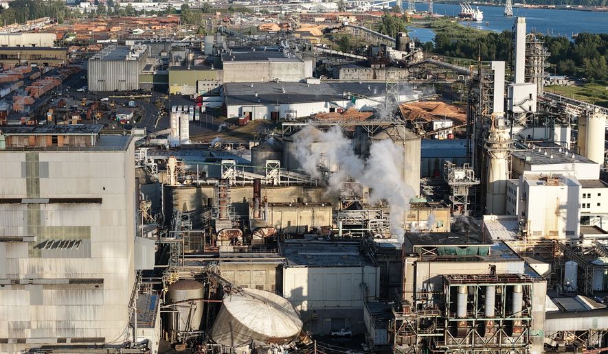 FILE - Damage is seen at Nippon Dynawave Packaging Co., after a tank containing hazardous liquid imploded, on Tuesday, May 26, 2026, in Longview, Wash. (Karen Ducey/The Seattle Times via AP, File)