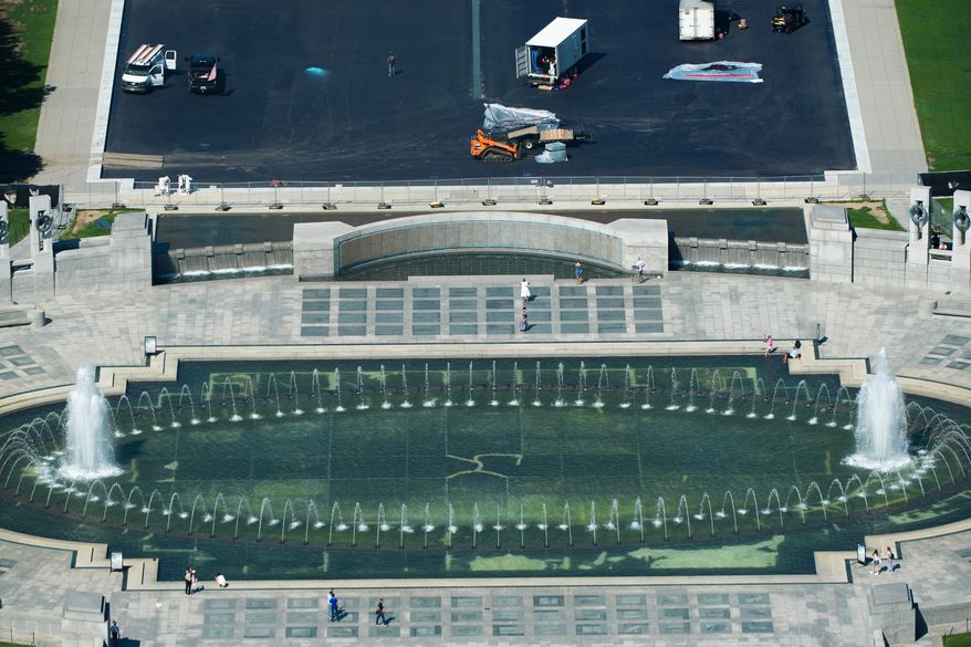 The World War II Memorial and the Lincoln Memorial Reflecting Pool are seen from the Washington Monument, Wednesday, Aug. 19, 2026, in Washington. (AP Photo/Alex Brandon)