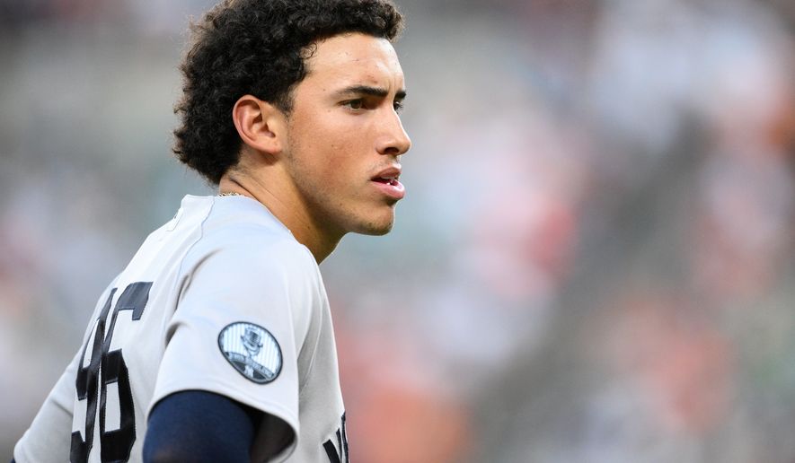 New York Yankees' George Lombard Jr. looks on during the second inning of a baseball game against the Baltimore Orioles, Thursday, Aug. 20, 2026, in Baltimore. (AP Photo/Nick Wass)