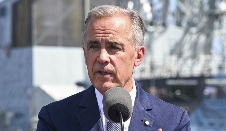 Canadian Prime Minister Mark Carney speaks at the Davie shipyard in Levis, Quebec on Monday, Aug. 24, 2026. (Jacques Boissinot/The Canadian Press via AP)