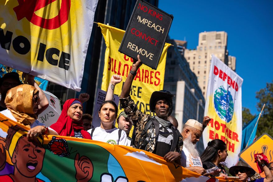 Protestors march through Manhattan up to Central Park during the "Make Billionaires Pay" climate protest, Sept. 20, 2025, in New York. (AP Photo/Angelina Katsanis, File)