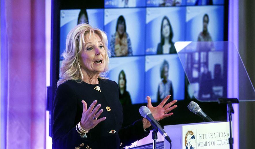 First lady Jill Biden addresses the 16th annual International Women of Courage (IWOC) Awards virtual ceremony at the State Department, Monday, March 14, 2022, in Washington. (Leah Millis, Pool via AP)