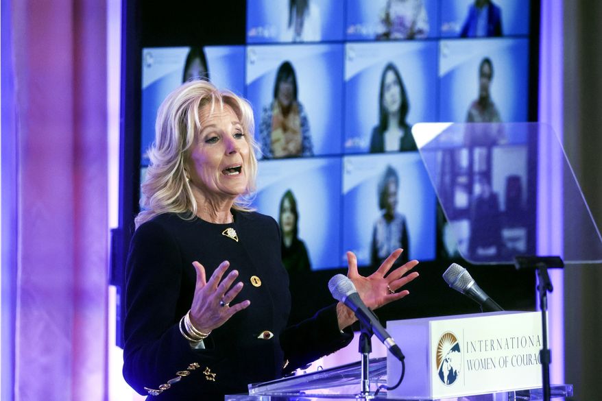 First lady Jill Biden addresses the 16th annual International Women of Courage (IWOC) Awards virtual ceremony at the State Department, Monday, March 14, 2022, in Washington. (Leah Millis, Pool via AP)