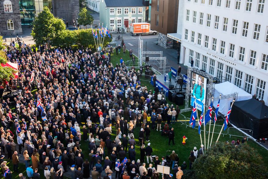 People gather for an "Afram Island," "Forward, Iceland," rally opposing the resumption of European Union accession talks at Austurvollur in Reykjavik, Iceland, Thursday, Aug. 27, 2026. (AP Photo/Marco Di Marco)