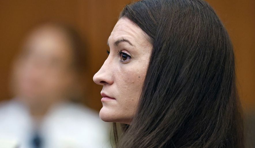Lindsay Clancy listens to a witness on video during her murder trial at Plymouth Superior Court, Monday, Aug. 24, 2026 in Plymouth, Mass. (Greg Derr/The Patriot Ledger via AP, Pool)