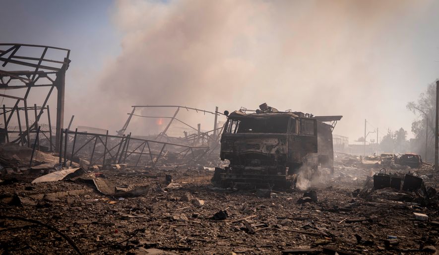 A view of the destruction after a Russian attack struck a warehouse, followed by an explosion, in the village of Myla, Kyiv region, Ukraine, Saturday, Aug. 29, 2026. (AP Photo/Dan Bashakov)