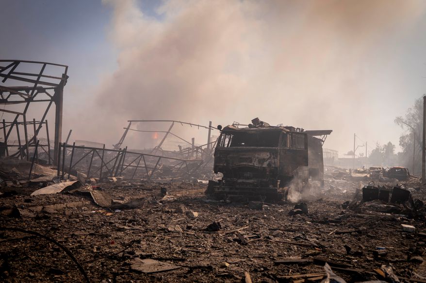 A view of the destruction after a Russian attack struck a warehouse, followed by an explosion, in the village of Myla, Kyiv region, Ukraine, Saturday, Aug. 29, 2026. (AP Photo/Dan Bashakov)