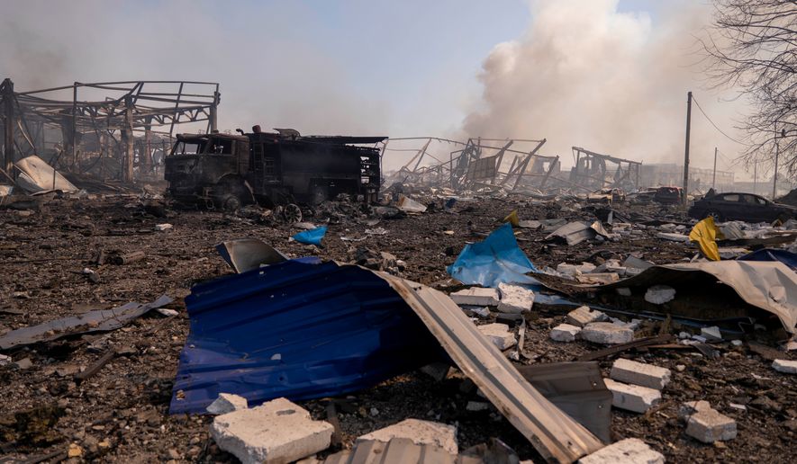 A view of the damage after a Russian attack struck a warehouse, followed by an explosion, in the village of Myla, Kyiv region, Ukraine, Saturday, Aug. 29, 2026. (AP Photo/Dan Bashakov)