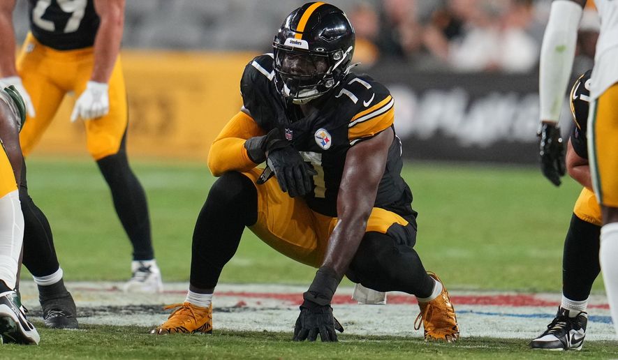 FILE - Pittsburgh Steelers offensive lineman Broderick Jones (77) lines up during an NFL exhibition football game against the Green Bay Packers in Pittsburgh Thursday, Aug. 13, 2026. (AP Photo/Gene J. Puskar, File)