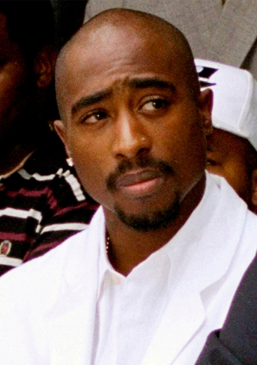 Rapper Tupac Shakur attends a voter registration event in South Central Los Angeles, Aug. 15, 1996. (AP Photo/Frank Wiese, File)