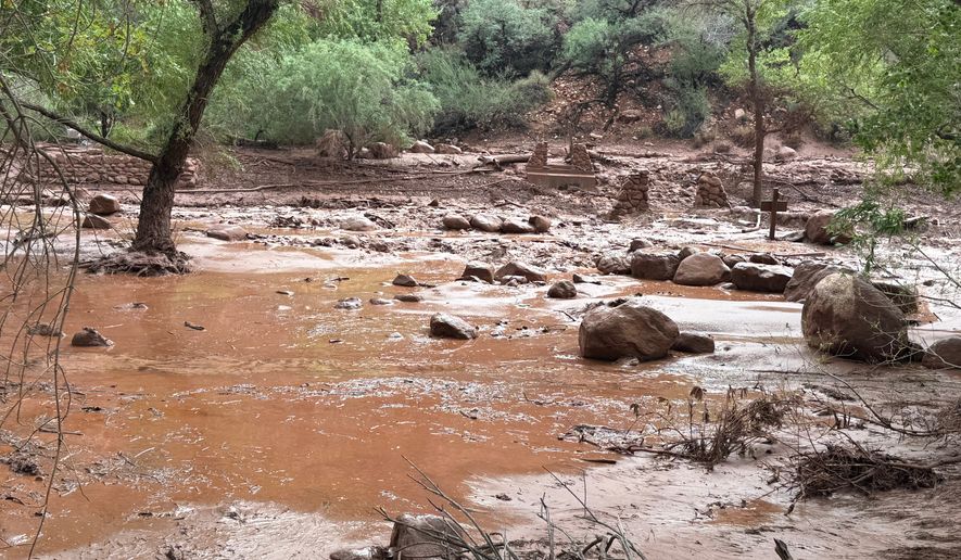 This photo provided by the National Park Service shows remnants of stone bridge pylons along Bright Angel Creek in the Grand Canyon following a flash flood that destroyed the footbridge, Saturday, Aug. 29, 2026. (James Thompson/National Park Service via AP)