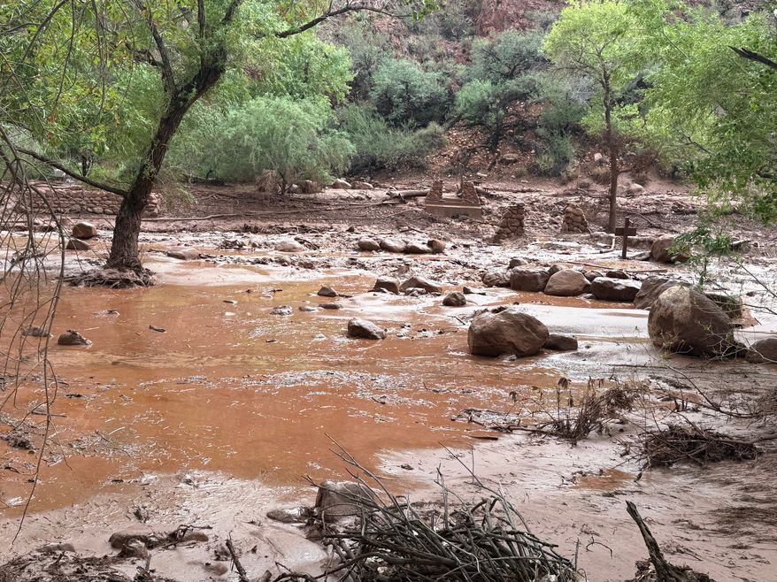 This photo provided by the National Park Service shows remnants of stone bridge pylons along Bright Angel Creek in the Grand Canyon following a flash flood that destroyed the footbridge, Saturday, Aug. 29, 2026. (James Thompson/National Park Service via AP)
