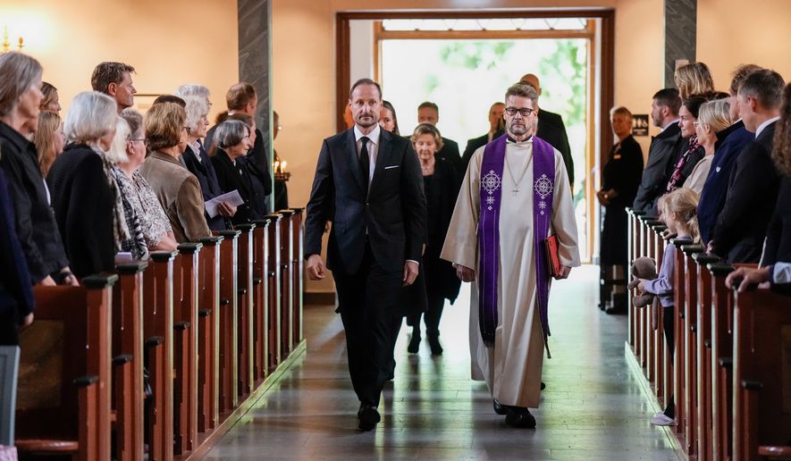 Norway's King Haakon arrives for the mourning service for King Harald in Asker church, Asker, Norway, Sunday Aug. 30, 2026. (Cornelius Poppe/NTB via AP)