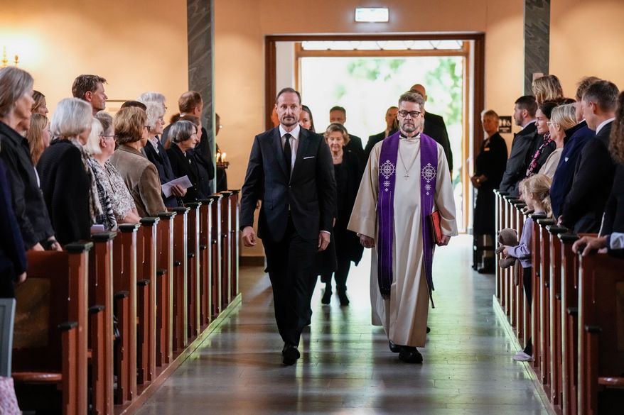 Norway's King Haakon arrives for the mourning service for King Harald in Asker church, Asker, Norway, Sunday Aug. 30, 2026. (Cornelius Poppe/NTB via AP)