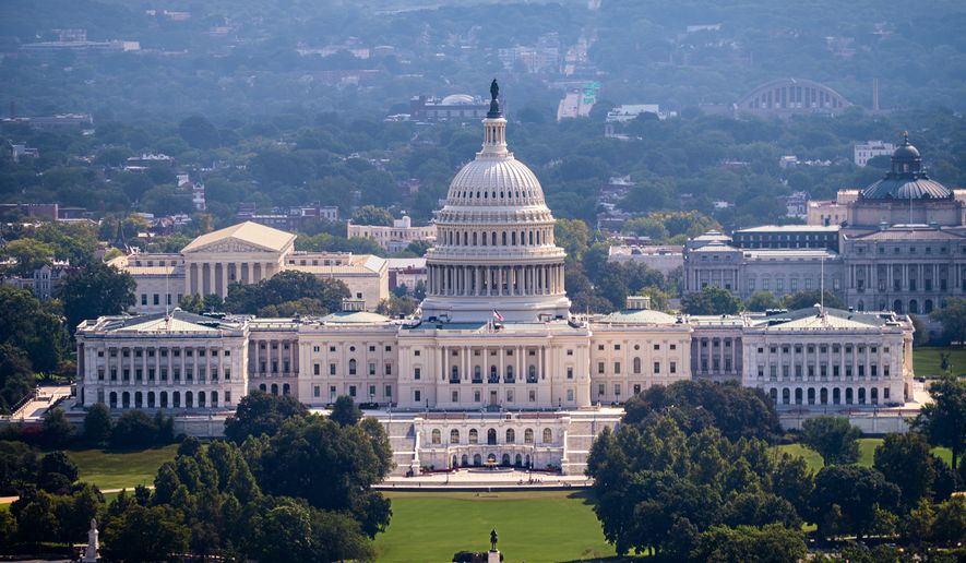 The U.S. Capitol is seen from the Washington Monument in Washington, Friday, Aug. 28, 2026. (AP Photo/J. Scott Applewhite)