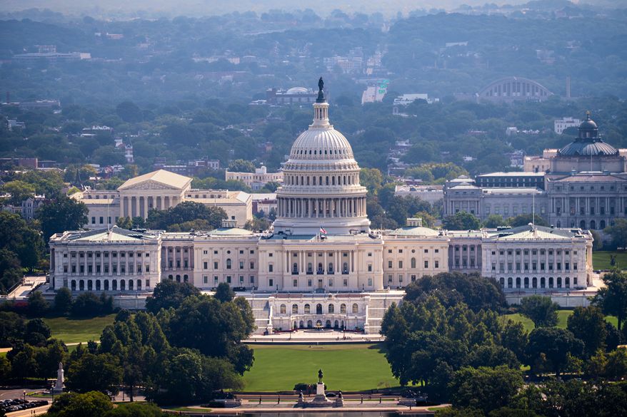 The U.S. Capitol is seen from the Washington Monument in Washington, Friday, Aug. 28, 2026. (AP Photo/J. Scott Applewhite)