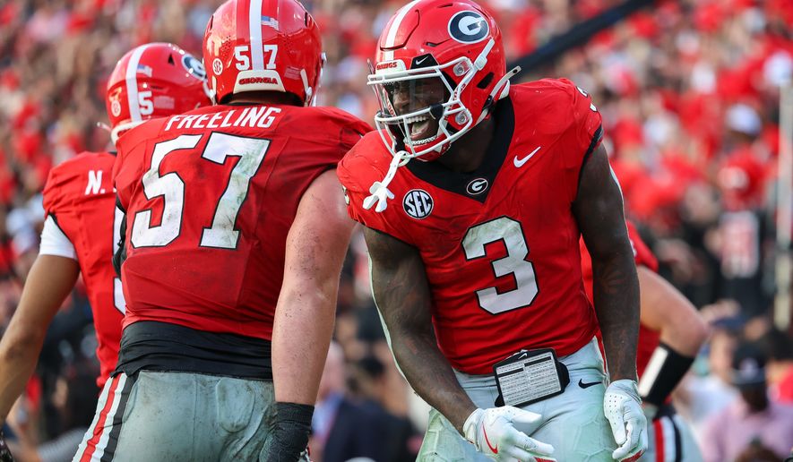 FILE - Georgia running back Nate Frazier (3) reacts after scoring a touchdown during the second half of an NCAA college football game against Mississippi, Oct. 18, 2025, in Athens, Ga. (AP Photo/Colin Hubbard, File)