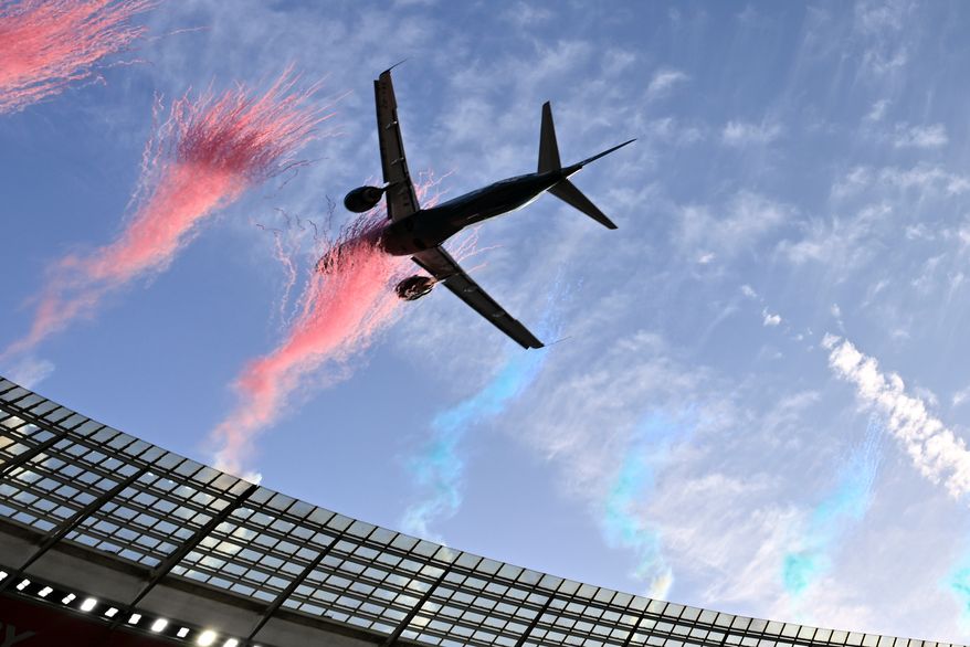 A jetliner flies over the stadium ahead of a second Test rugby match between South Africa and New Zealand, in Cape Town, South Africa, Saturday, Aug. 29, 2026. (AP Photo)