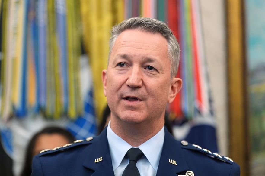 Gen. Dan Caine, chairman of the Joint Chiefs of Staff, speaks during a meeting about military families with President Donald Trump, in the Oval Office of the White House, Monday, Aug. 3, 2026, in Washington. (AP Photo/Alex Brandon)