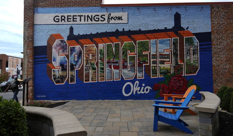 A mural that reads "Greetings from Springfield Ohio" is seen painted on an alley wall Tuesday, Sept. 17, 2024, in Springfield, Ohio. (AP Photo/Carolyn Kaster)