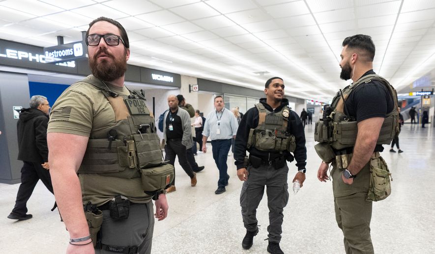 U.S. Immigration and Customs Enforcement (ICE) agents patrol around the Washington Dulles International Airport in Chantilly, Va., on Tuesday, March 24, 2026. (AP Photo/Manuel Balce) **FILE**