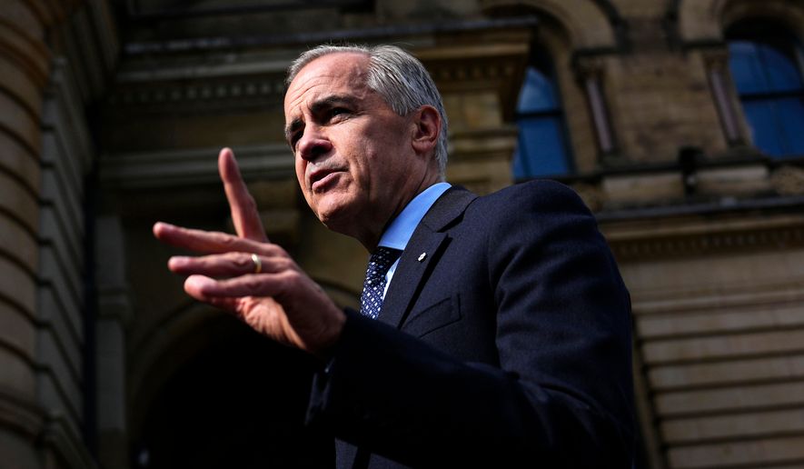 Canadian Prime Minister Mark Carney speaks with members of the media as he arrives at the Office of the Prime Minister and Privy Council in Ottawa, on Tuesday, Sept. 1, 2026. (Justin Tang/The Canadian Press via AP)