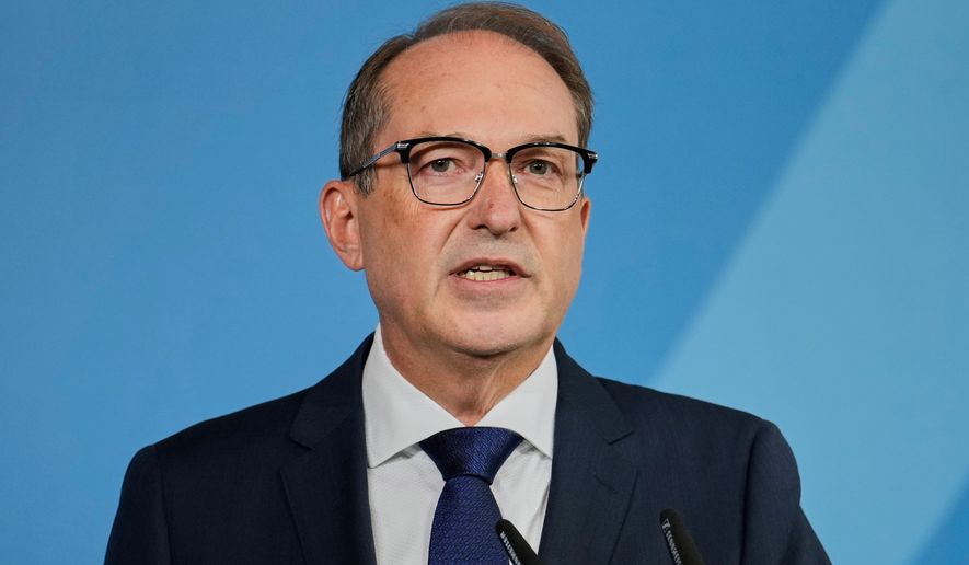 Germany's Interior Minister Alexander Dobrindt speaks to the media during a press conference in Berlin on Tuesday, Sept. 1, 2026, about the attempted attack on Leipzig/Halle Airport last month with a drone loaded with explosives.(AP Photo/Ebrahim Noroozi)