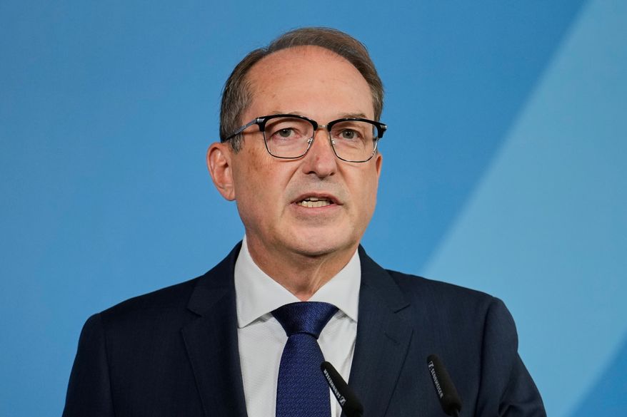 Germany's Interior Minister Alexander Dobrindt speaks to the media during a press conference in Berlin on Tuesday, Sept. 1, 2026, about the attempted attack on Leipzig/Halle Airport last month with a drone loaded with explosives.(AP Photo/Ebrahim Noroozi)