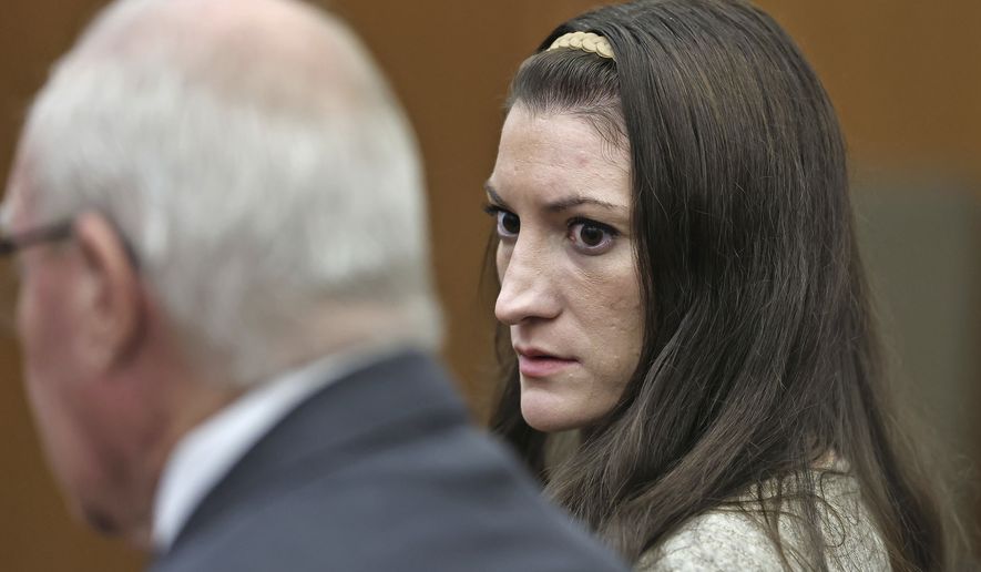 Lindsay Clancy looks to her lawyer Kevin Reddington as the jury keeps deliberating at her murder trial at Plymouth Superior Court in Plymouth, Mass., Tuesday, Sept. 1, 2026. (Greg Derr/The Patriot Ledger via AP, Pool)