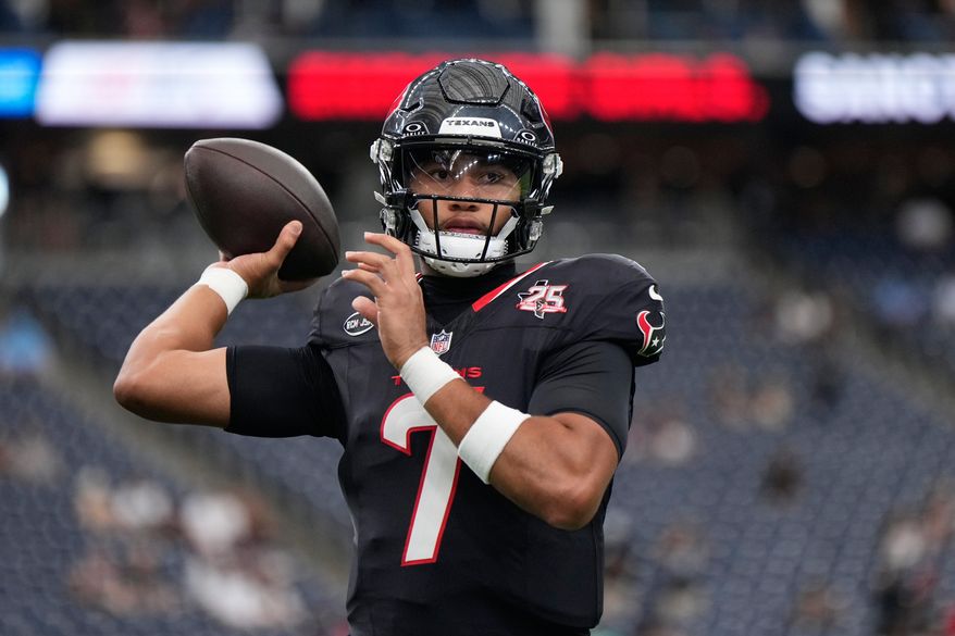 Houston Texans quarterback C.J. Stroud (7) throws before an NFL preseason football game against the Las Vegas Raiders, Thursday, Aug. 20, 2026, in Houston. (AP Photo/Ashley Landis)