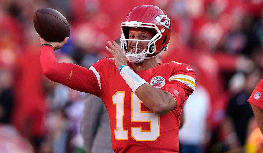 Kansas City Chiefs quarterback Patrick Mahomes warms up prior to a preseason NFL football game against the Seattle Seahawks, Friday, Aug. 28, 2026, in Kansas City, Mo. (AP Photo/Charlie Riedel)