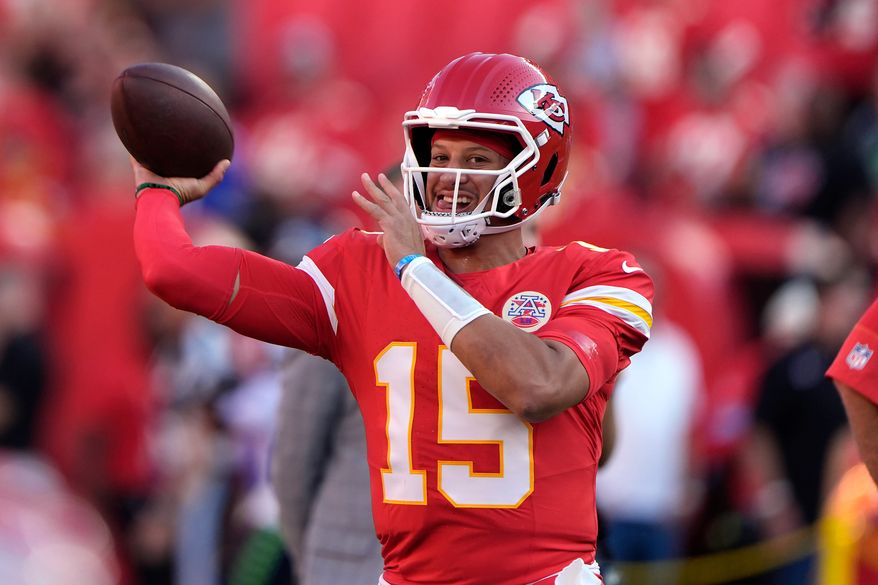 Kansas City Chiefs quarterback Patrick Mahomes warms up prior to a preseason NFL football game against the Seattle Seahawks, Friday, Aug. 28, 2026, in Kansas City, Mo. (AP Photo/Charlie Riedel)